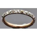 Georgian / Victorian eternity ring set with old cut diamonds in a foiled setting, size F