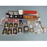 A collection of various coins and medal coinage to include R.A.F and flight related examples, a