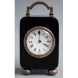 Early 20thC French Boudoir clock, the enamelled Roman dial in tortoiseshell case with silver