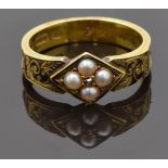Victorian 15ct gold mourning ring set with a diamond surrounded by split pearls, black enamel to the