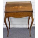 French rosewood desk with inlaid decoration, fitted interior, pierced brass gallery back and gilt