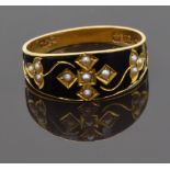 Victorian 18ct gold ring set with seed pearls in a cross design on black enamel ground, Birmingham