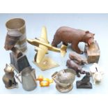 Carved Black Forest bears, brass aeroplane, table lighter, collectables including Art Deco napkin