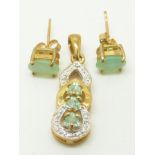 A 9ct gold pendant set with three Paraiba tourmalines and diamonds, and a pair of 9ct gold