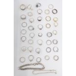 A 9ct gold ring (0.8g), a collection of silver and costume rings and a silver bracelet