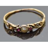 Georgian / Victorian yellow metal ring set with a seed pearl and rubies, size J