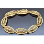 French 18ct gold bracelet made up of oval pierced links, 19cm, 23.9g