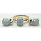 A 9ct gold ring set with a opal cut blue fire opal cabochon and a pair of similar earrings, 5.8g,
