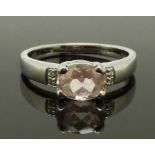 A 9ct white gold ring set with morganite and diamonds, size N, 3.10g