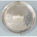 Victorian hallmarked silver circular salver with beaded edge, engraved decoration and raised on