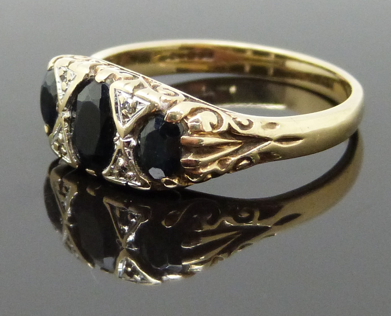 A 9ct gold ring set with sapphires and diamonds, size S/T, 4.43g - Image 2 of 2