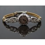 Eszera Art Deco platinum ladies wristwatch set with diamond set case and links, blued hands,
