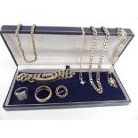 A collection of silver jewellery including bracelet, two rings, three necklaces, filigree