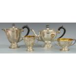 Mappin and Webb George V hallmarked silver four piece tea set, the sugar bowl and milk jug with gilt