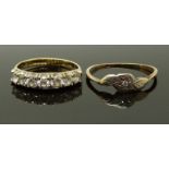 A 9ct gold ring set with cubic zirconia and a 9ct gold ring set with a diamond, size J & K, 2.9g