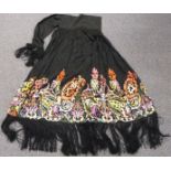 A 19th/20thC Chinese embroidered cloak with fringe and integral scarf tie, 170 x 110cm