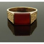 A 9ct gold signet ring set with carnelian agate, size Q, 3.51g