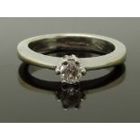 An 18ct white gold ring set with a diamond of approximately 0.2ct, size I, 4.72g