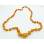 Baltic amber beaded necklace made up of 46 graduated oval beads, largest bead 28 x 22mm, 60g