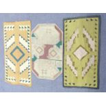 Three geometric handmade rugs pre-1950, largest 134 x 64cm