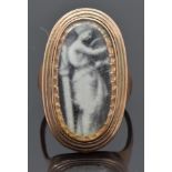 Georgian mourning ring set with an image of a classical lady, the inner band inscribed "William