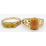 Two 9ct gold rings set with Indonesian opals, 4.6g, size S, M