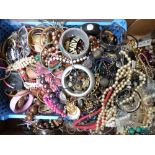 A collection of costume jewellery including beads, jewellery boxes, etc