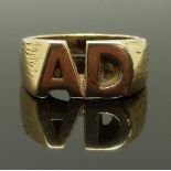 A 9ct gold ring with A D initials, size N, 8.72g