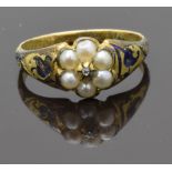Victorian mourning ring set with a diamond surrounded by split pearls and enamel to the shoulders