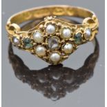 Victorian 15ct gold ring set with a rose cut diamond surrounded by seed pearls and tourmalines,