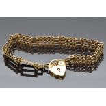 A 9ct gold gate bracelet with heart clasp, 7g