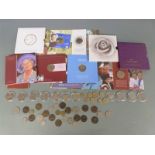 A collection of modern crowns, £5 coins, collectable examples etc, some in presentation packs