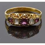 Victorian 15ct gold ring set with garnets and quartz, with a chased band, Birmingham 1873, size S
