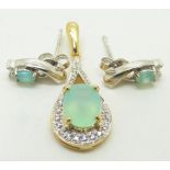 A 9ct gold pendant set with an oval cut Paraiba opal and diamonds and a pair of similar earrings,