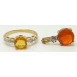 A 9ct gold ring set with a round cut fire opal and diamonds and a pendant set with a fire opal and