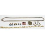 Four pairs of silver earrings set with various opals, an opal bracelet, silver earrings and silver