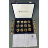 A cased collection of thirty two Diamond Wedding photographic portrait Westminster coins with