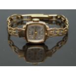 Avia 9ct gold ladies wristwatch with 9ct gold hands and markers, silver dial and 17 jewel
