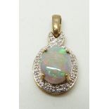 A 9ct gold pendant set with a black opal and diamonds, 1.7g