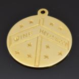A 14k gold pendant/ charm reading "Vine Hollywood", 3.3g