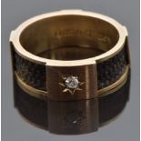 A 9ct gold mourning ring set with a diamond and plaited hair to the band, hallmarked Chester 1916,