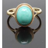 A 9ct gold ring set with a turquoise cabochon, size L/M, 2.06g