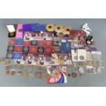 A large collection of commemorative crowns, most in capsules, some in presentation packs