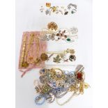 A collection of costume jewellery including vintage brooches, 9ct gold earrings, necklaces etc