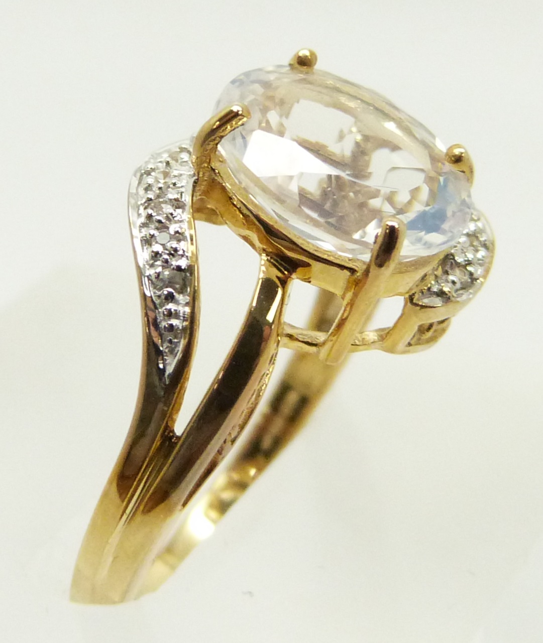 A 9ct gold ring set with an oval cut ice opal and diamonds, 2.8g, size M - Image 2 of 2