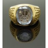 An 18ct French gold signet ring set with carved aquamarine, size O, 23.76g