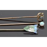 Two 9ct gold stick pins, one set with a sapphire and the other an opal together with a silver