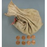 Five pounds worth of uncirculated QEII pennies, in sealed canvas bank bag labelled Dec 1968