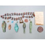 Small collection of ancient Egyptian and ancient Egyptian style items to include shabtis, scarabs,