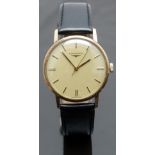 Longines 9ct gold gentleman's wristwatch ref. 17177 with gold hands and baton markers, champagne